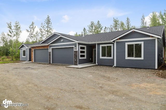 1521 N Kerry Ln, Wasilla, AK 99654 - ranch-style house with an attached garage and dirt driveway