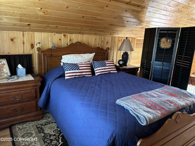 41873 S Running River Dr, Remote, AK 99676 - bedroom featuring wooden ceiling and wooden walls