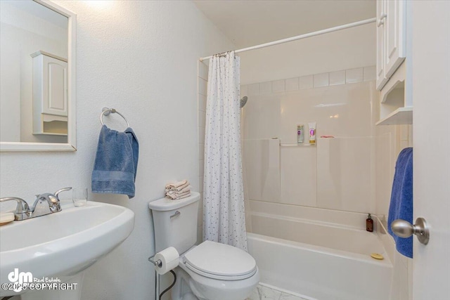 1920 E 56th Ave, Anchorage, AK 99507 - full bathroom featuring toilet, a sink, and shower / tub combo with curtain