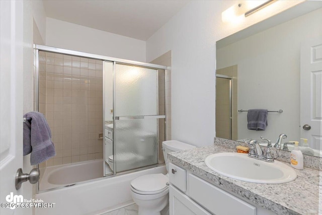 1920 E 56th Ave, Anchorage, AK 99507 - full bath with bath / shower combo with glass door, vanity, and toilet