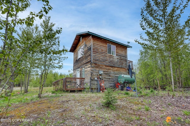 704 S Freeman Way, Big Lake, AK 99623 - view of property exterior with a deck
