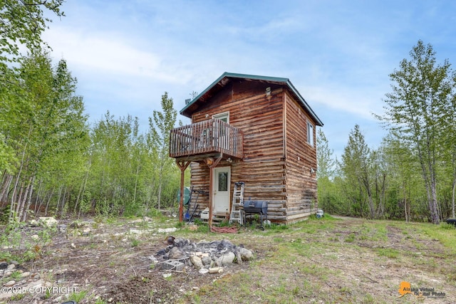 704 S Freeman Way, Big Lake, AK 99623 - rear view of house featuring a wooden deck