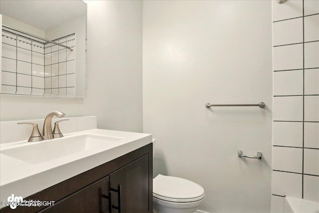 7341 Huntsmen Cir Unit 19C, Anchorage, AK 99518 - bathroom featuring vanity, toilet, a shower, and baseboards