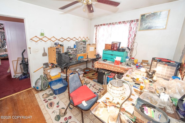 1403 W 34th Ave, Anchorage, AK 99503 - miscellaneous room featuring a ceiling fan and wood finished floors