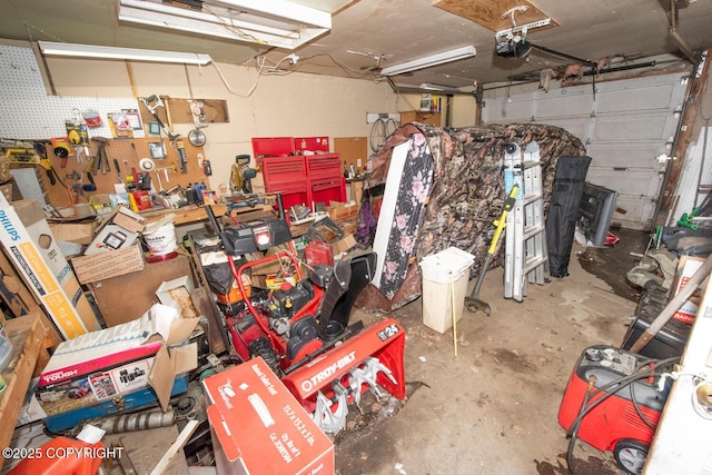 1403 W 34th Ave, Anchorage, AK 99503 - garage with a garage door opener and a workshop area
