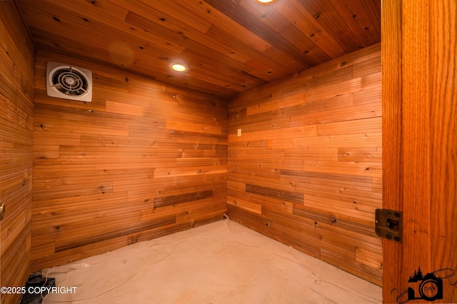2100 N Palomino Ln, Palmer, AK 99645 - unfurnished room with wooden walls, concrete flooring, a sauna, recessed lighting, and wooden ceiling