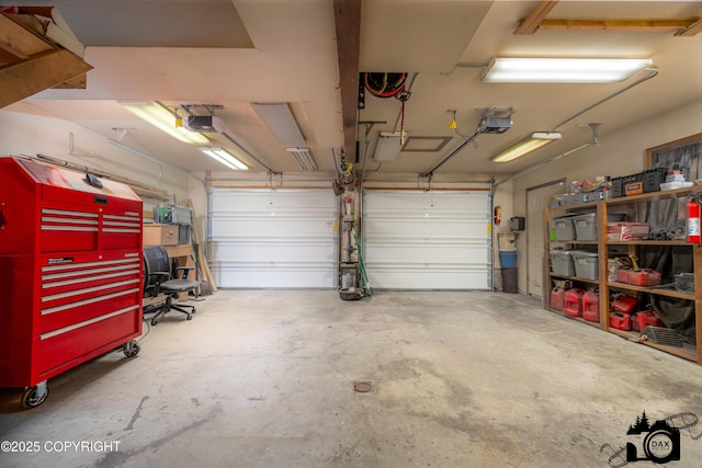 2100 N Palomino Ln, Palmer, AK 99645 - garage featuring a garage door opener