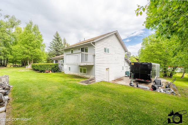 2100 N Palomino Ln, Palmer, AK 99645 - rear view of house with a yard