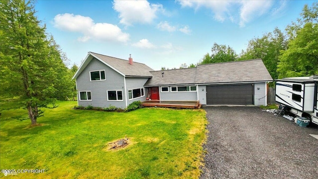 655 N Smith Rd, Palmer, AK 99645 - traditional home with a front lawn, a garage, a wooden deck, and driveway