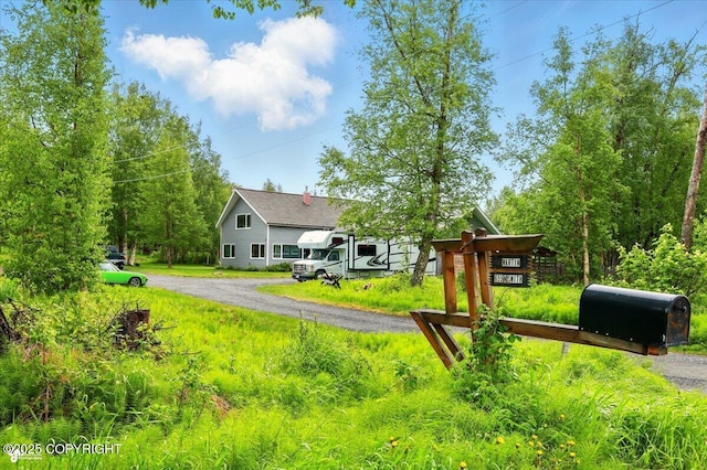 655 N Smith Rd, Palmer, AK 99645 - view of front facade with driveway