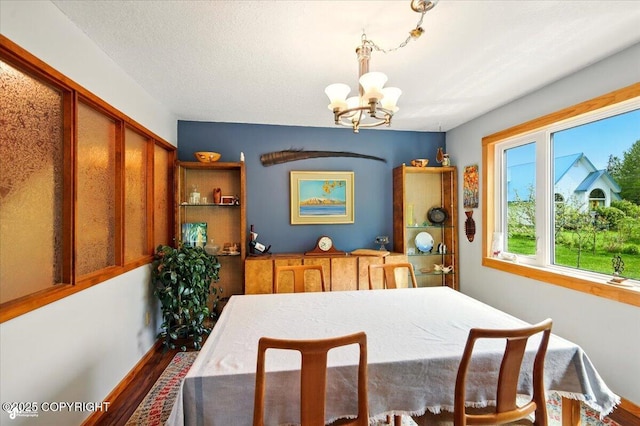 655 N Smith Rd, Palmer, AK 99645 - dining space with wood finished floors and a chandelier