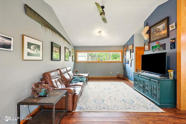 655 N Smith Rd, Palmer, AK 99645 - living area with lofted ceiling, a ceiling fan, wood finished floors, and baseboards