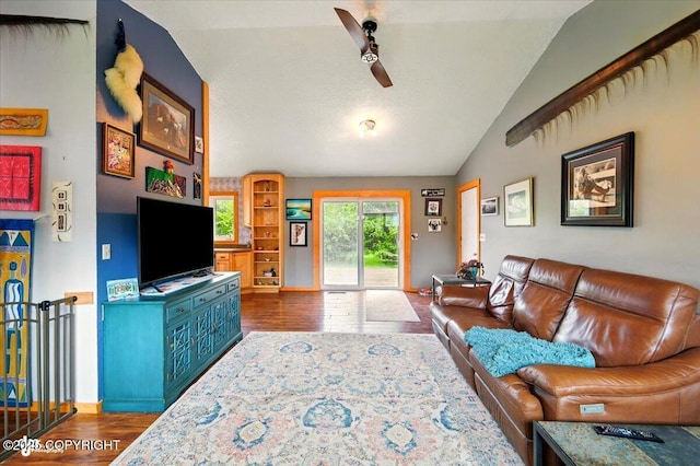 655 N Smith Rd, Palmer, AK 99645 - living room featuring lofted ceiling, wood finished floors, baseboards, and ceiling fan