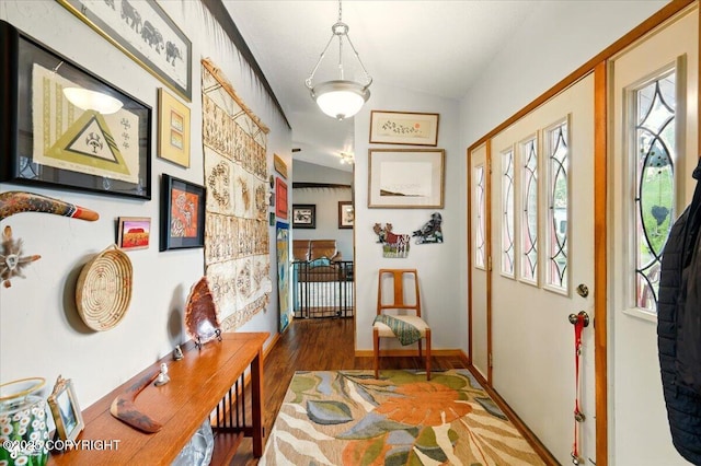 655 N Smith Rd, Palmer, AK 99645 - foyer entrance with wood finished floors, baseboards, and vaulted ceiling