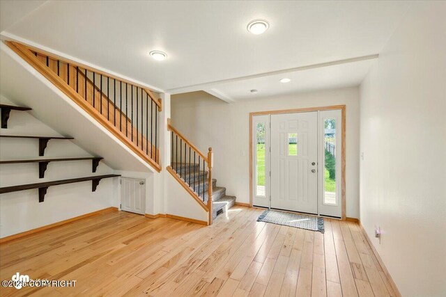4588 Gold Mint Dr, Wasilla, AK 99654 - foyer with light wood-style flooring, stairs, baseboards, and recessed lighting