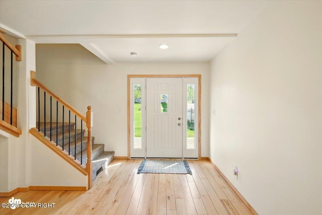 4588 Gold Mint Dr, Wasilla, AK 99654 - entryway with wood finished floors, stairs, baseboards, and recessed lighting