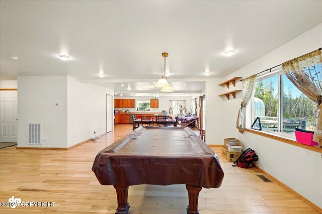 4588 Gold Mint Dr, Wasilla, AK 99654 - rec room with light wood-style floors, pool table, and baseboards