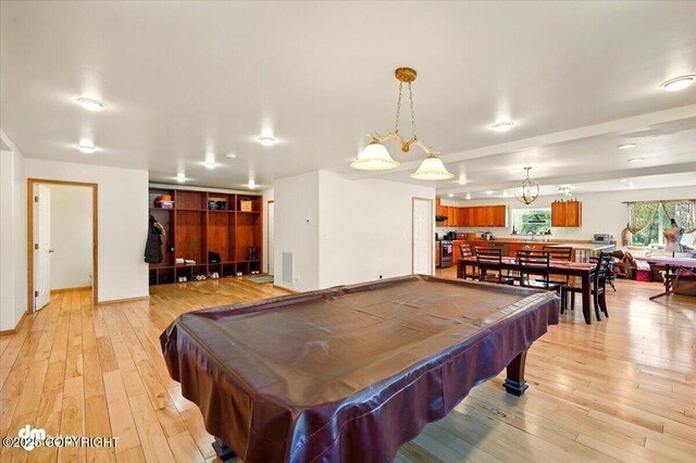 4588 Gold Mint Dr, Wasilla, AK 99654 - playroom featuring light wood-style floors and pool table