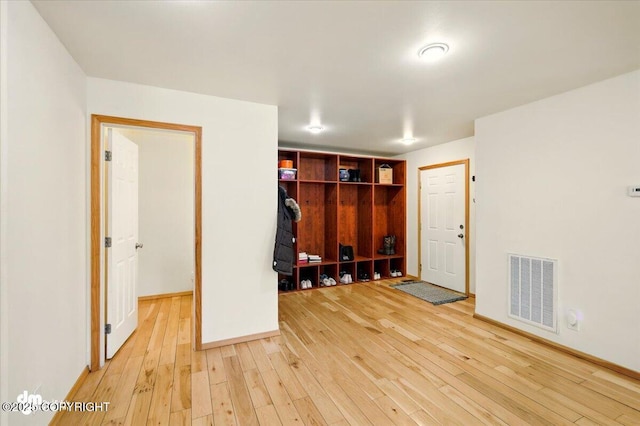 4588 Gold Mint Dr, Wasilla, AK 99654 - unfurnished bedroom with light wood-style floors and baseboards