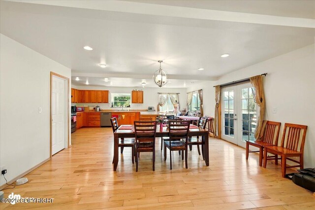 4588 Gold Mint Dr, Wasilla, AK 99654 - dining area with light wood-type flooring, a chandelier, recessed lighting, and french doors