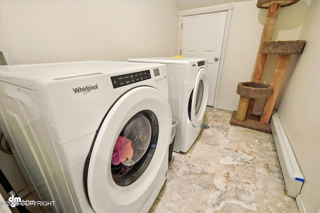 4588 Gold Mint Dr, Wasilla, AK 99654 - laundry area with washer and dryer and a baseboard radiator