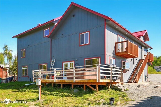 4588 Gold Mint Dr, Wasilla, AK 99654 - rear view of property featuring a wooden deck and a balcony