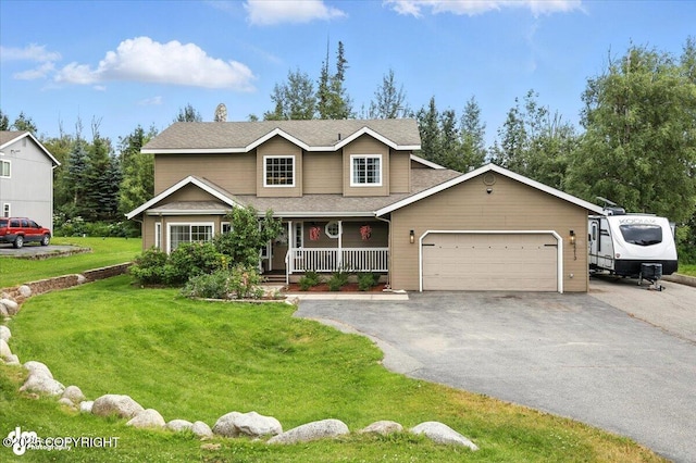 2213 N Tabasco Cat Dr, Palmer, AK 99645 - traditional-style house featuring a porch, driveway, a garage, a front lawn, and a shingled roof
