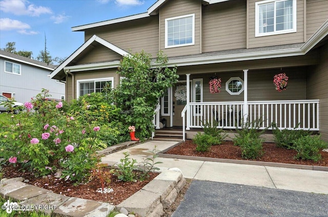 2213 N Tabasco Cat Dr, Palmer, AK 99645 - view of front of house featuring covered porch