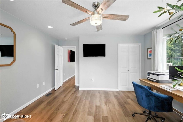 2213 N Tabasco Cat Dr, Palmer, AK 99645 - home office with wood finished floors, ceiling fan, and recessed lighting