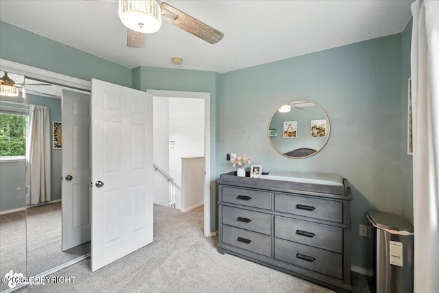 2213 N Tabasco Cat Dr, Palmer, AK 99645 - bedroom with light colored carpet and ceiling fan