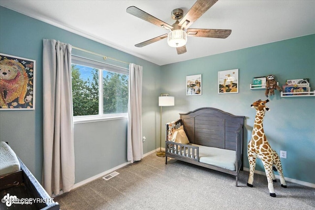 2213 N Tabasco Cat Dr, Palmer, AK 99645 - carpeted bedroom with baseboards and a ceiling fan