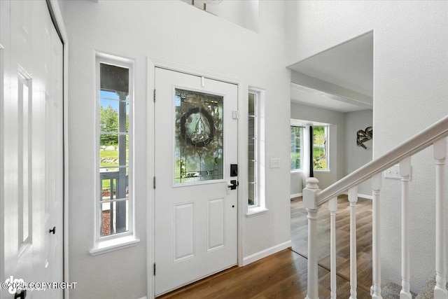 2213 N Tabasco Cat Dr, Palmer, AK 99645 - foyer with dark wood finished floors and stairs
