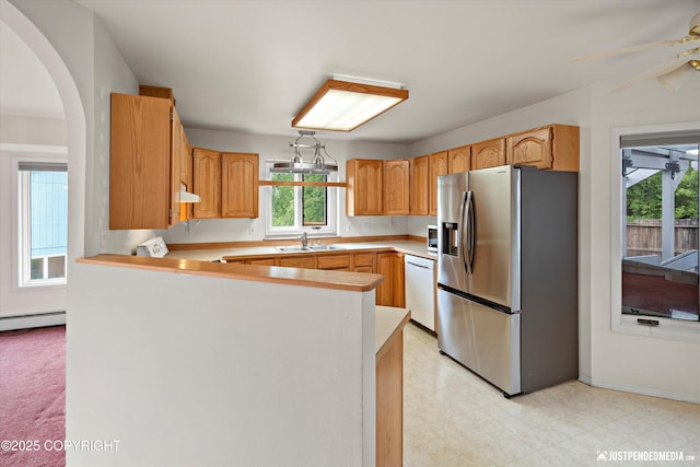 10931 Adanak Cir, Eagle River, AK 99577 - kitchen featuring stainless steel fridge with ice dispenser, white dishwasher, a sink, a peninsula, and light countertops