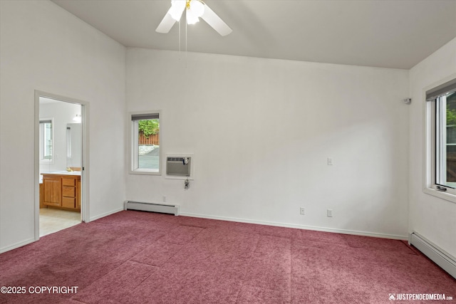 10931 Adanak Cir, Eagle River, AK 99577 - empty room featuring baseboard heating, a baseboard heating unit, a wall mounted AC, and light carpet