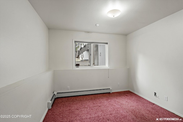 10931 Adanak Cir, Eagle River, AK 99577 - carpeted spare room featuring a baseboard radiator and baseboards