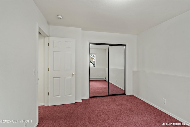 10931 Adanak Cir, Eagle River, AK 99577 - unfurnished bedroom with carpet flooring, baseboard heating, a closet, and baseboards
