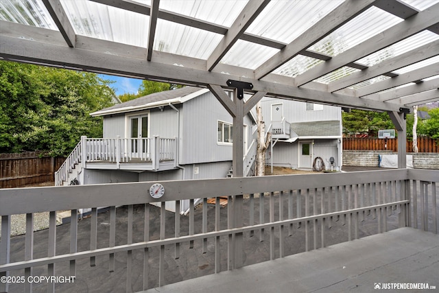 10931 Adanak Cir, Eagle River, AK 99577 - wooden terrace featuring stairway and a pergola