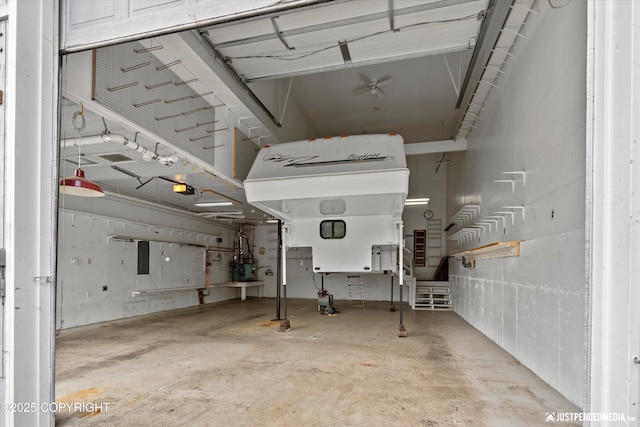 10931 Adanak Cir, Eagle River, AK 99577 - garage with electric panel and a garage door opener