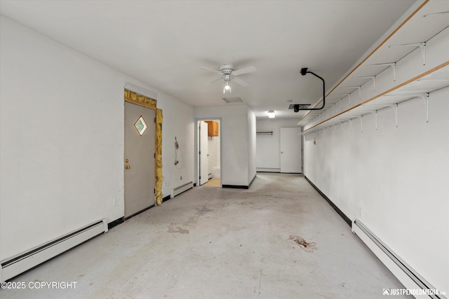 10931 Adanak Cir, Eagle River, AK 99577 - garage with a baseboard heating unit and ceiling fan