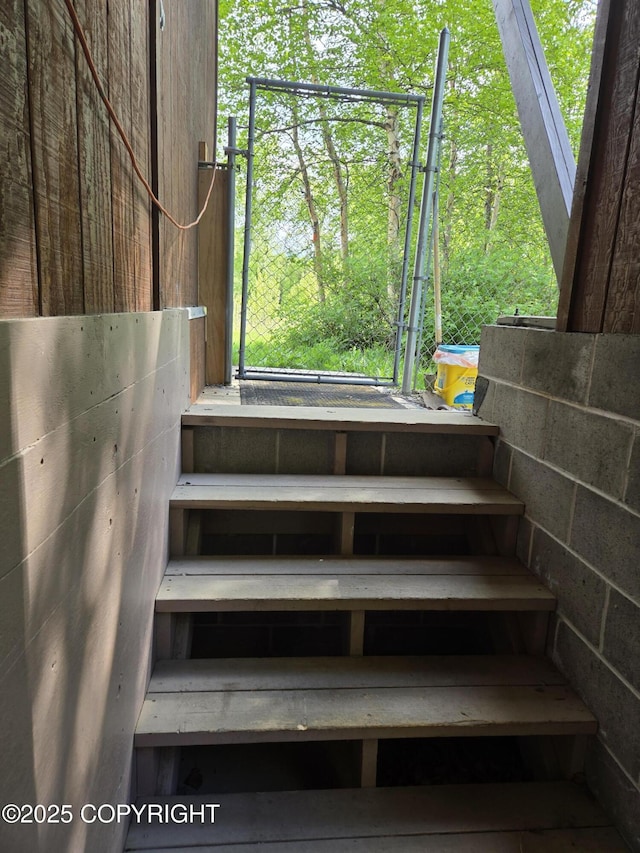 17690 E Idle Dr, Palmer, AK 99645 - staircase with concrete block wall