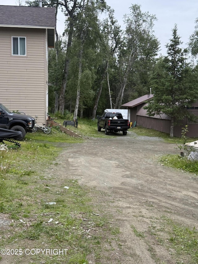 17690 E Idle Dr, Palmer, AK 99645 - view of yard with driveway