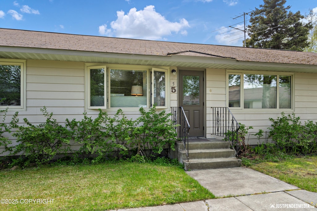 1015 Beech Ln # 5, Anchorage, AK 99501 - view of front of property featuring a front yard