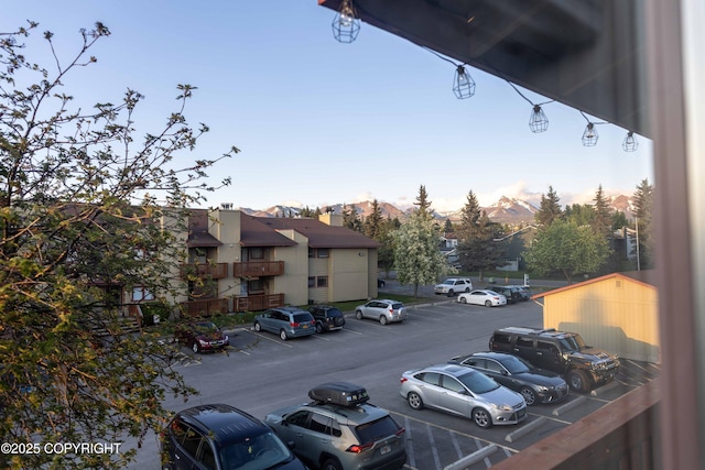 10260 Jamestown Dr # A25, Anchorage, AK 99507 - uncovered parking lot with a residential view