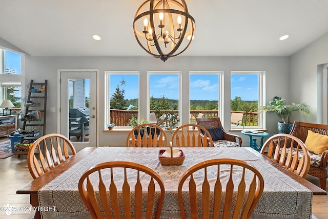 41722 Charlie Dr, Homer, AK 99603 - dining room featuring wood finished floors, healthy amount of natural light, a chandelier, and recessed lighting