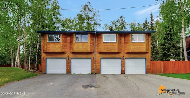 18739 Sarichef Loop, Eagle River, AK 99577 - view of front facade featuring an attached garage and driveway