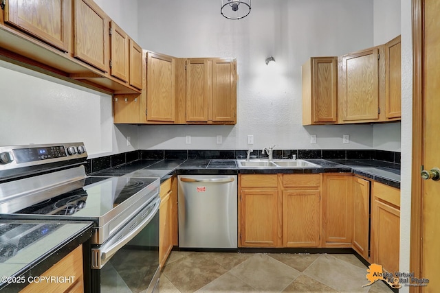 18739 Sarichef Loop, Eagle River, AK 99577 - kitchen with appliances with stainless steel finishes and a sink