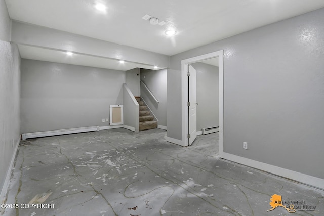 18739 Sarichef Loop, Eagle River, AK 99577 - finished basement with a baseboard heating unit, stairway, and baseboards