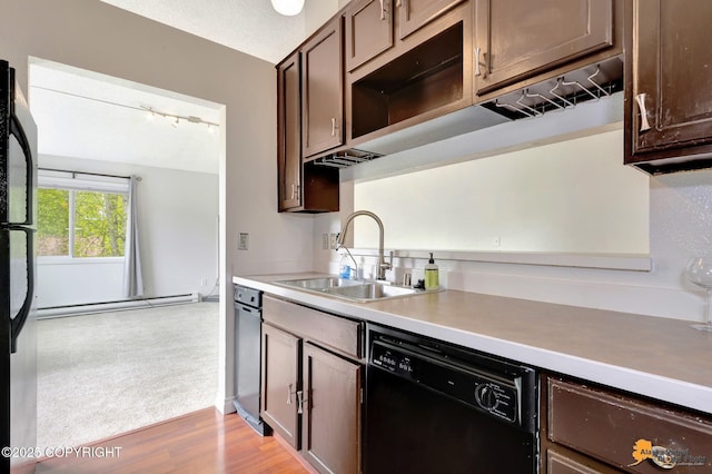 7075 Weimer Rd # 6, Anchorage, AK 99502 - kitchen with a sink, black appliances, a baseboard heating unit, and dark brown cabinetry