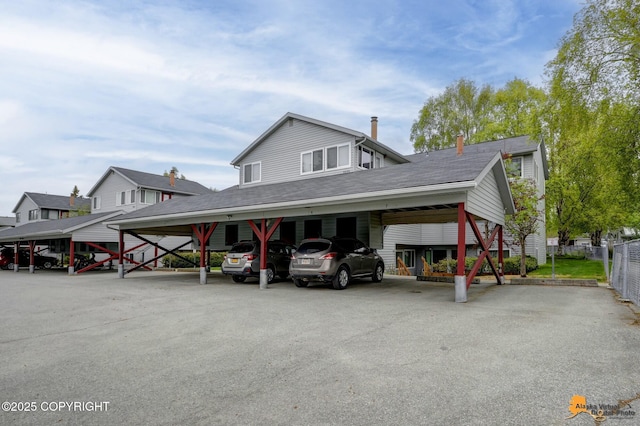 7075 Weimer Rd # 6, Anchorage, AK 99502 - view of front of property with covered parking