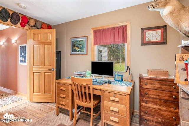 20838 Helluva St, Chugiak, AK 99567 - home office with light wood-type flooring and baseboards